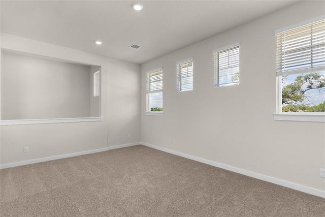 2705 Sage Ranch Dr Unit 26, Leander, TX 78641 - carpeted empty room with baseboards and recessed lighting