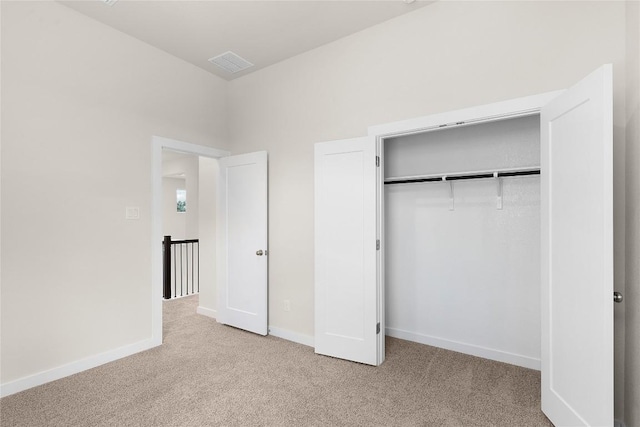 2705 Sage Ranch Dr Unit 26, Leander, TX 78641 - unfurnished bedroom featuring carpet, a closet, and baseboards
