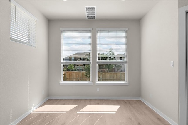 2705 Sage Ranch Dr Unit 26, Leander, TX 78641 - unfurnished room featuring wood finished floors and baseboards