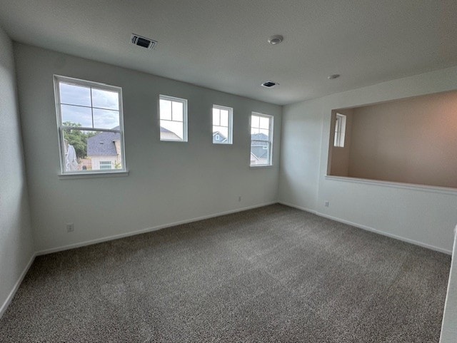 2705 Sage Ranch Dr Unit 26, Leander, TX 78641 - spare room with carpet flooring and baseboards