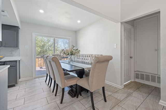1002 Parkside Cir, Round Rock, TX 78664 - dining room featuring baseboards and recessed lighting