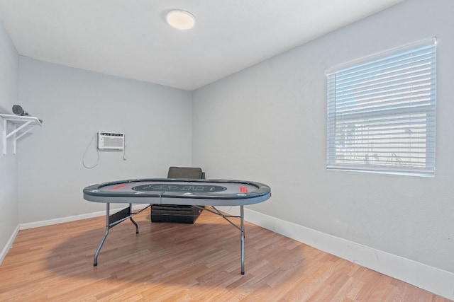 1002 Parkside Cir, Round Rock, TX 78664 - rec room featuring light wood finished floors and a wall unit AC