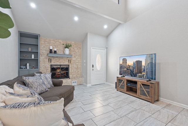1002 Parkside Cir, Round Rock, TX 78664 - living room featuring high vaulted ceiling, a fireplace, recessed lighting, and built in shelves