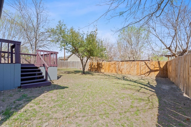 1002 Parkside Cir, Round Rock, TX 78664 - fenced backyard with a deck and stairs