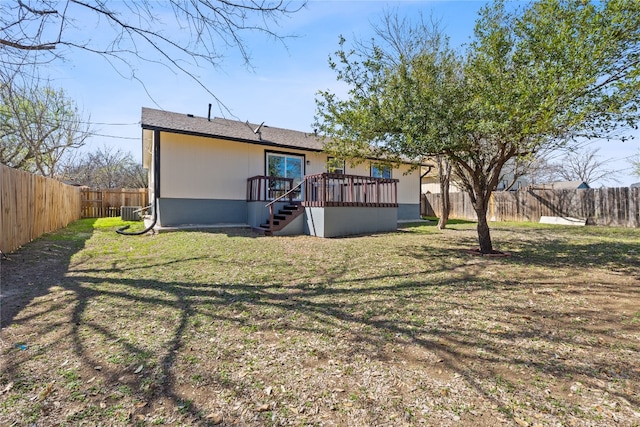 1002 Parkside Cir, Round Rock, TX 78664 - rear view of house featuring a deck, a fenced backyard, and stairs