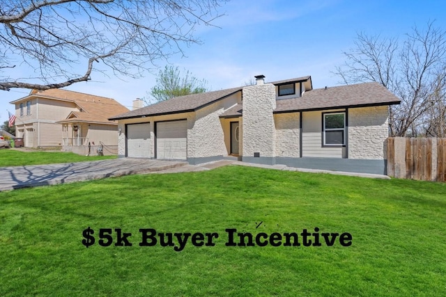 1002 Parkside Cir, Round Rock, TX 78664 - view of front of property with a chimney, stone siding, a garage, and driveway