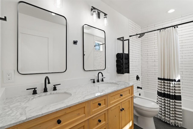 703 E 15th St, Georgetown, TX 78626 - full bathroom featuring shower / tub combo and double vanity