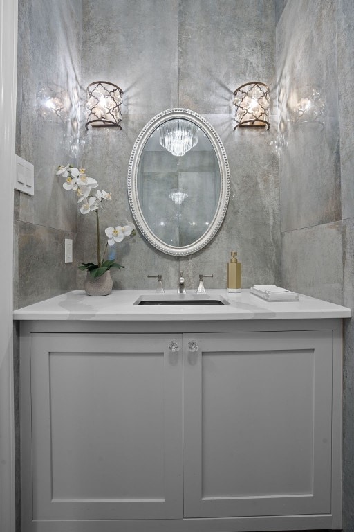 2110 Travis Heights Blvd, Austin, TX 78704 - full bath with double vanity and a chandelier