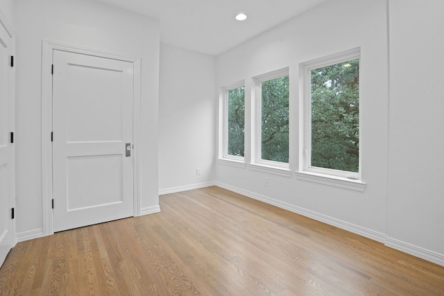 2110 Travis Heights Blvd, Austin, TX 78704 - spare room with light wood-type flooring, baseboards, and recessed lighting