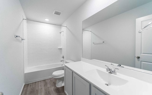 201 Lt Rusty Dr, Jarrell, TX 76537 - full bath with toilet, wood finished floors, vanity, and bathtub / shower combination