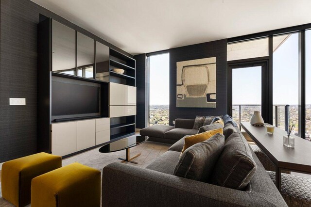 44 E Ave Unit 2601, Austin, TX 78701 - living room with plenty of natural light and a wall of windows