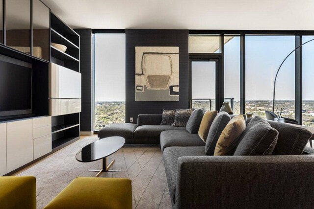 44 E Ave Unit 2601, Austin, TX 78701 - living room featuring plenty of natural light and floor to ceiling windows