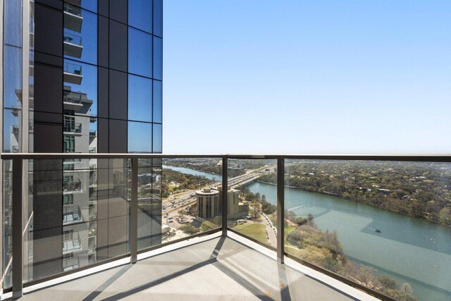 44 E Ave Unit 2601, Austin, TX 78701 - balcony featuring a water view and central AC unit
