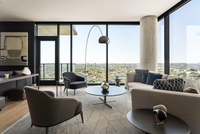 44 E Ave Unit 2601, Austin, TX 78701 - living area featuring a wall of windows and wood finished floors