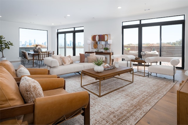 2209 S 1st St Unit 407, Austin, TX 78704 - living area featuring recessed lighting and wood finished floors