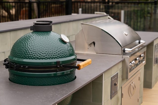 2209 S 1st St Unit 407, Austin, TX 78704 - view of patio featuring area for grilling