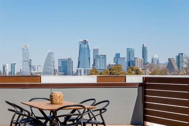 2209 S 1st St Unit 407, Austin, TX 78704 - balcony featuring a skyline view