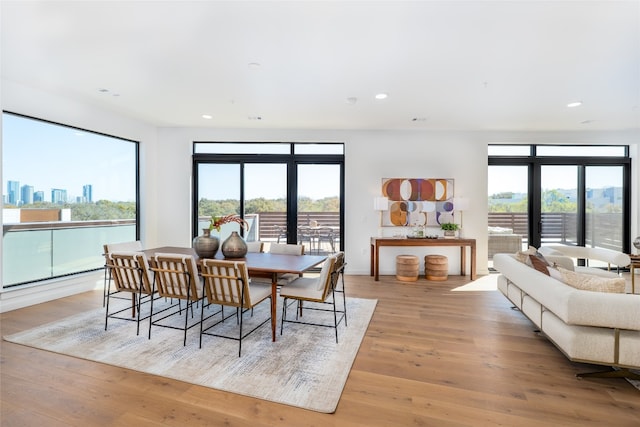 2209 S 1st St Unit 407, Austin, TX 78704 - dining space featuring light wood finished floors and recessed lighting