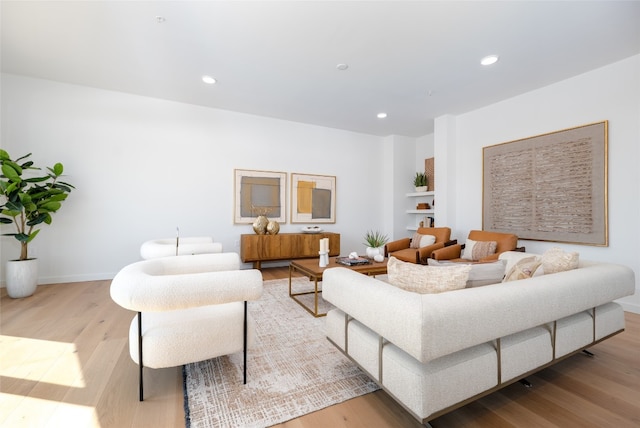 2209 S 1st St Unit 407, Austin, TX 78704 - living area with wood finished floors and recessed lighting