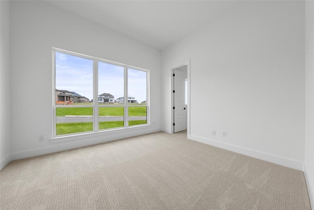 1304 Novara Trl, Leander, TX 78641 - spare room featuring light colored carpet and baseboards