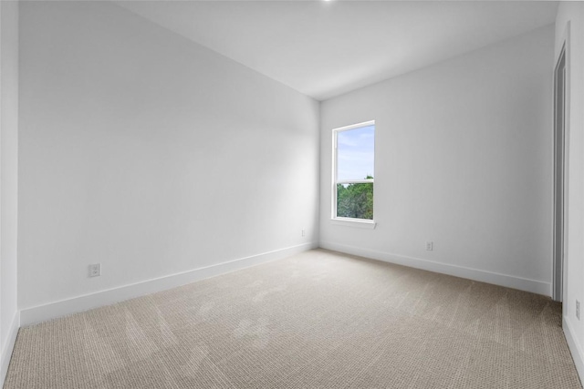 1304 Novara Trl, Leander, TX 78641 - empty room with light carpet and baseboards
