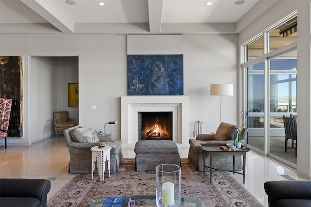 715 Cutlass, Lakeway, TX 78734 - living area featuring tile patterned flooring, beamed ceiling, a warm lit fireplace, recessed lighting, and coffered ceiling