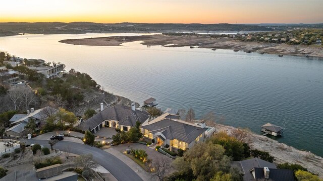 715 Cutlass, Lakeway, TX 78734 - aerial view at dusk of a water view and a residential view