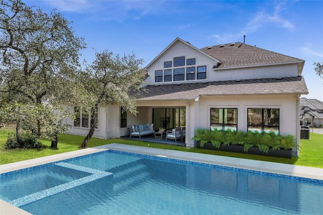 10928 Seawall Dr, Austin, TX 78737 - rear view of property with an outdoor living space, an outdoor pool, stucco siding, a lawn, and roof with shingles