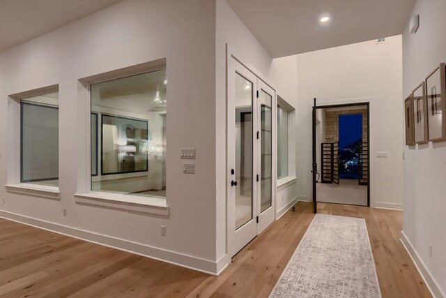 10928 Seawall Dr, Austin, TX 78737 - hallway with light wood-style floors and recessed lighting
