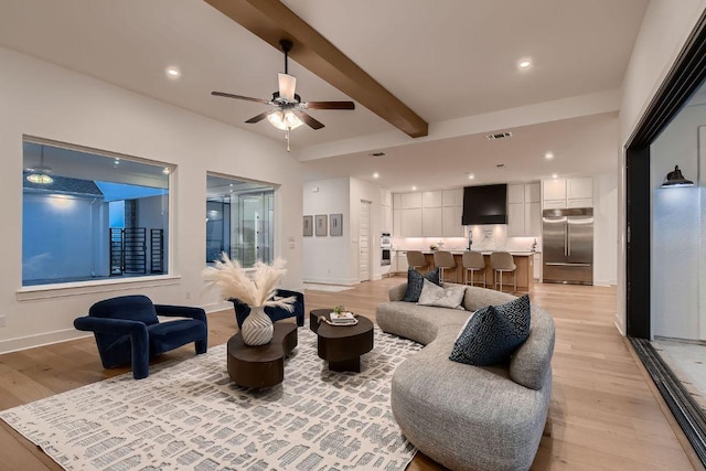 10928 Seawall Dr, Austin, TX 78737 - living area featuring light wood-type flooring, a ceiling fan, beam ceiling, and recessed lighting