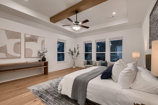 10928 Seawall Dr, Austin, TX 78737 - bedroom featuring light wood-style flooring, beamed ceiling, and a ceiling fan