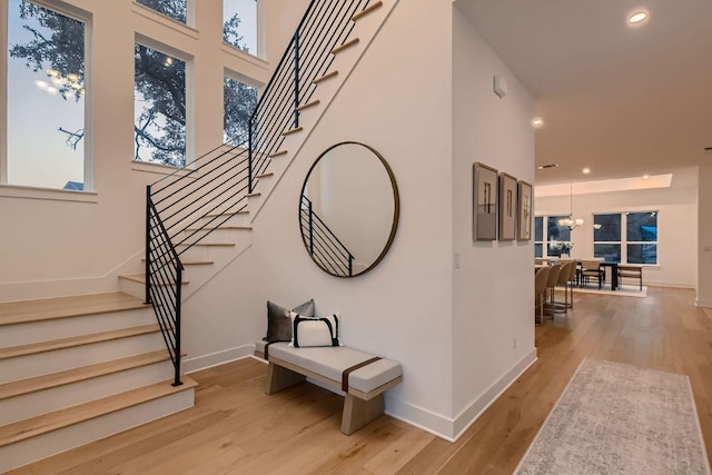 10928 Seawall Dr, Austin, TX 78737 - stairway with wood finished floors and recessed lighting