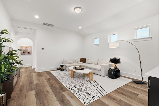 702 Serene Estates Dr, Austin, TX 78738 - living room featuring light wood-type flooring, baseboards, recessed lighting, and lofted ceiling