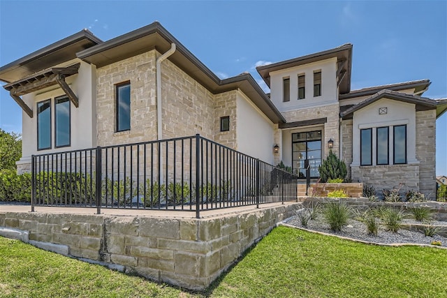 702 Serene Estates Dr, Austin, TX 78738 - contemporary home featuring stone siding, stucco siding, and a front yard