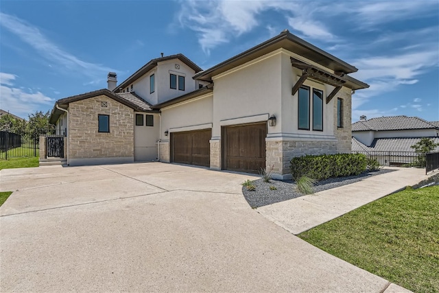 702 Serene Estates Dr, Austin, TX 78738 - view of front of house featuring stone siding, driveway, stucco siding, an attached garage, and a chimney
