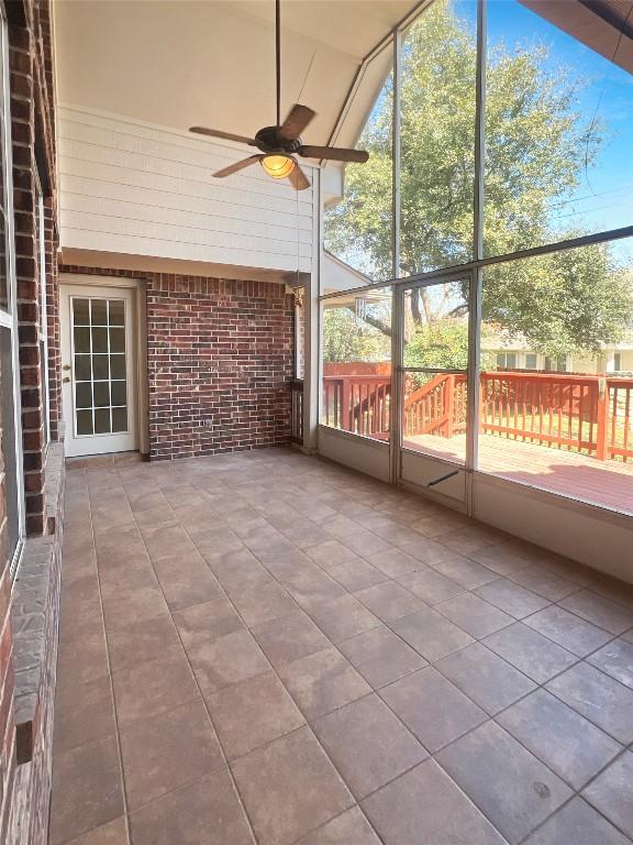 2804 Butler National Dr, Pflugerville, TX 78660 - unfurnished sunroom featuring a ceiling fan and vaulted ceiling