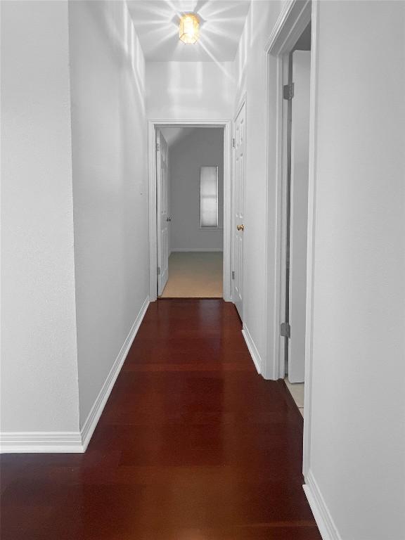 2804 Butler National Dr, Pflugerville, TX 78660 - corridor with wood finished floors and baseboards