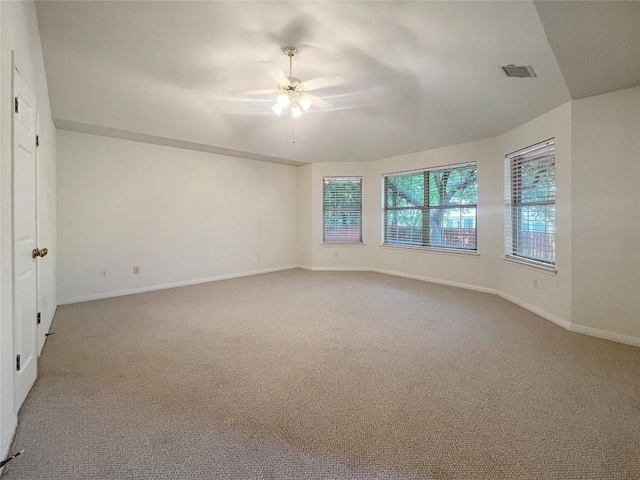2804 Butler National Dr, Pflugerville, TX 78660 - carpeted empty room with a ceiling fan and baseboards