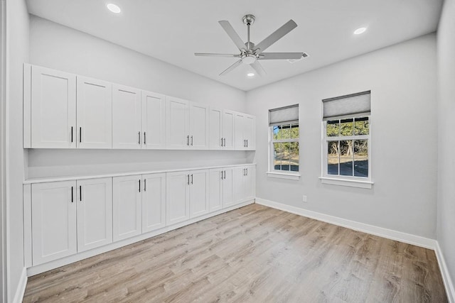 21603 Thomas Cv, Lago Vista, TX 78645 - empty room featuring light wood-style floors, baseboards, recessed lighting, and a ceiling fan