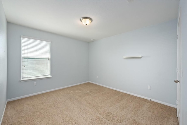 122 Denton Dr, Hutto, TX 78634 - carpeted spare room with baseboards