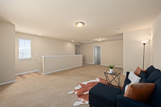 122 Denton Dr, Hutto, TX 78634 - living room with recessed lighting, visible vents, light colored carpet, and baseboards