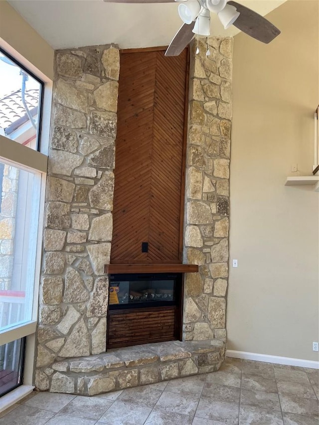 room details with baseboards and a ceiling fan