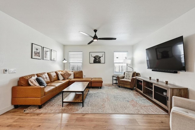 7004 Ashen Ln, Austin, TX 78747 - living room featuring a ceiling fan and wood finished floors