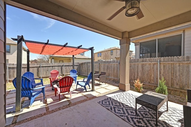 7004 Ashen Ln, Austin, TX 78747 - fenced backyard with ceiling fan, a patio, and a residential view