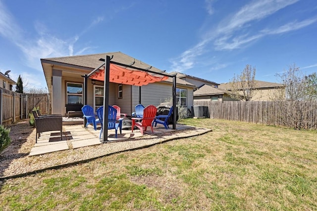 7004 Ashen Ln, Austin, TX 78747 - back of house featuring a fenced backyard, a patio, and an outdoor hangout area