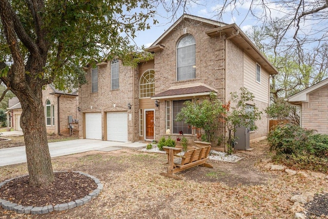 2708 Winding Brook Dr, Austin, TX 78748 - traditional-style house with concrete driveway, a garage, and brick siding