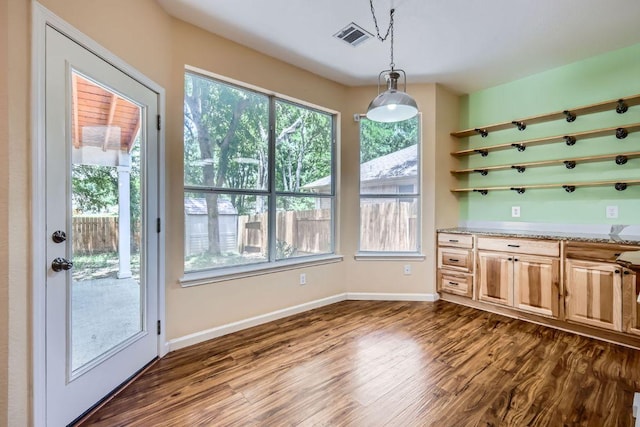 2708 Winding Brook Dr, Austin, TX 78748 - unfurnished dining area with dark wood finished floors and baseboards