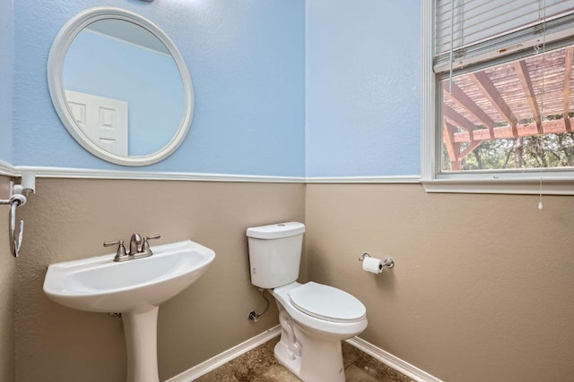 2708 Winding Brook Dr, Austin, TX 78748 - bathroom with toilet and baseboards