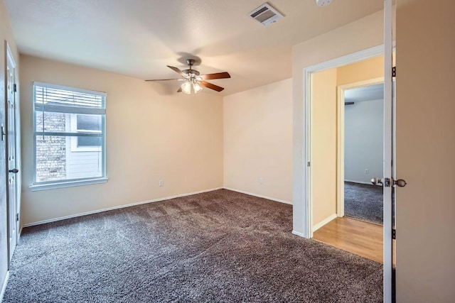 2708 Winding Brook Dr, Austin, TX 78748 - carpeted spare room featuring ceiling fan and baseboards