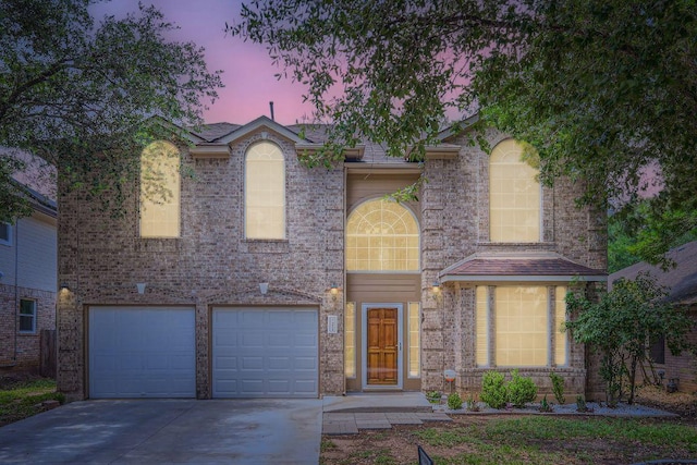 2708 Winding Brook Dr, Austin, TX 78748 - view of front of home with concrete driveway and an attached garage